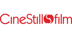 Red text logo with stylized letter 'S' resembling a stop sign.