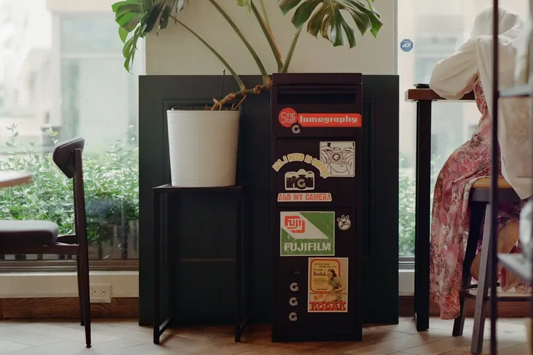Graination film drop-off box inside Forest Café in North York